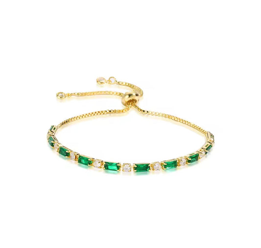 The Gold Emerald Green Aqurisé Slider Tennis Bracelet